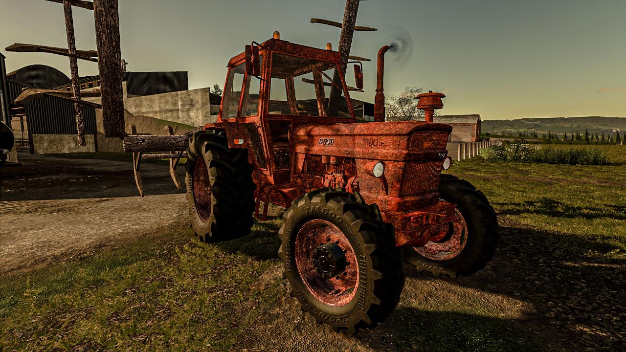 Tracteur rouillé avec vieille charrue