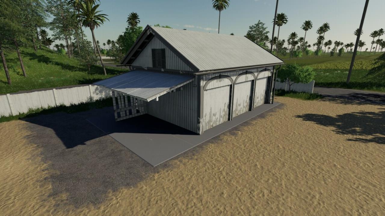 Garage de ferme avec portes de travail et lumière