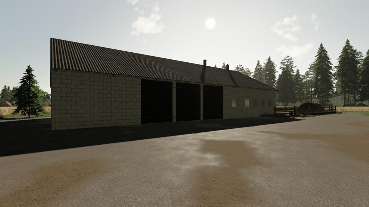 Une grange avec une porcherie