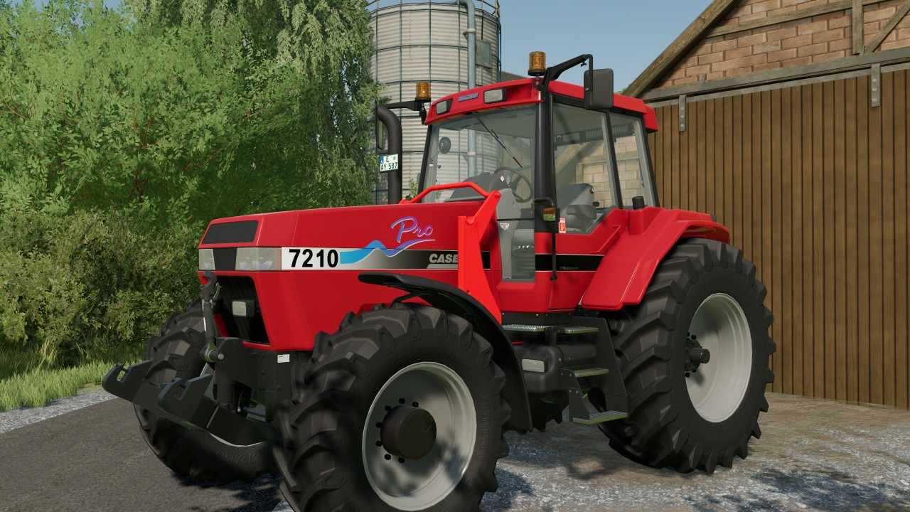 Case 7200 Pro с фронтальным погрузчиком