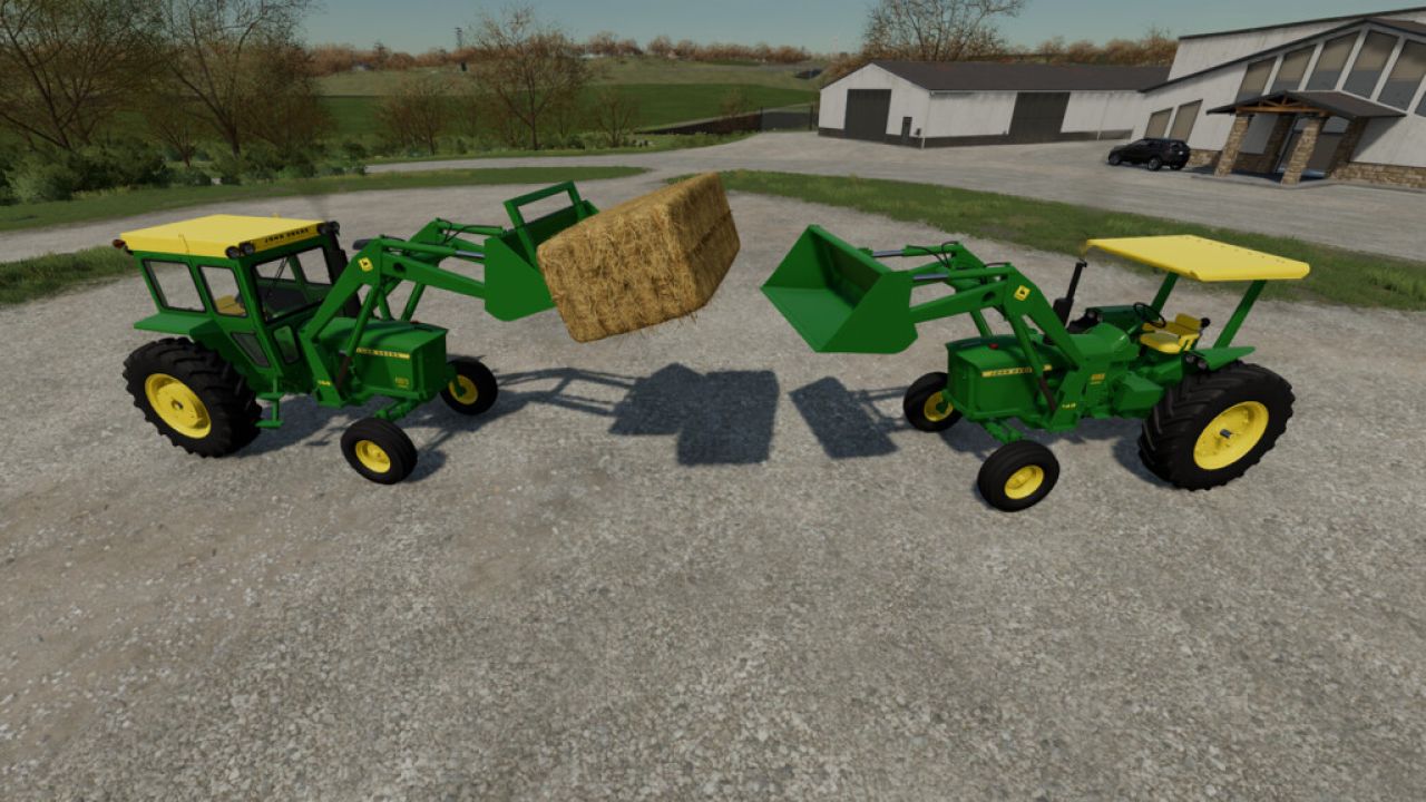 Фронтальные погрузчики John Deere 148 и 158