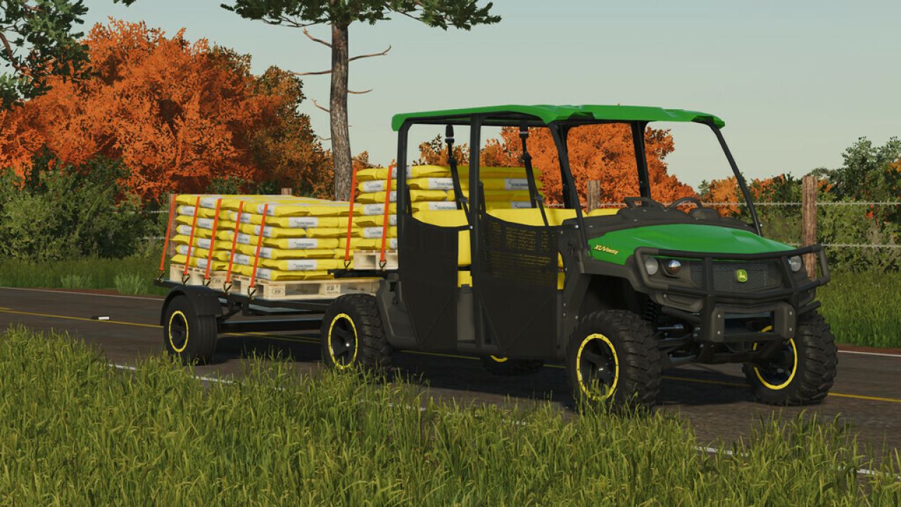 John Deere XUV865E y carro de carga