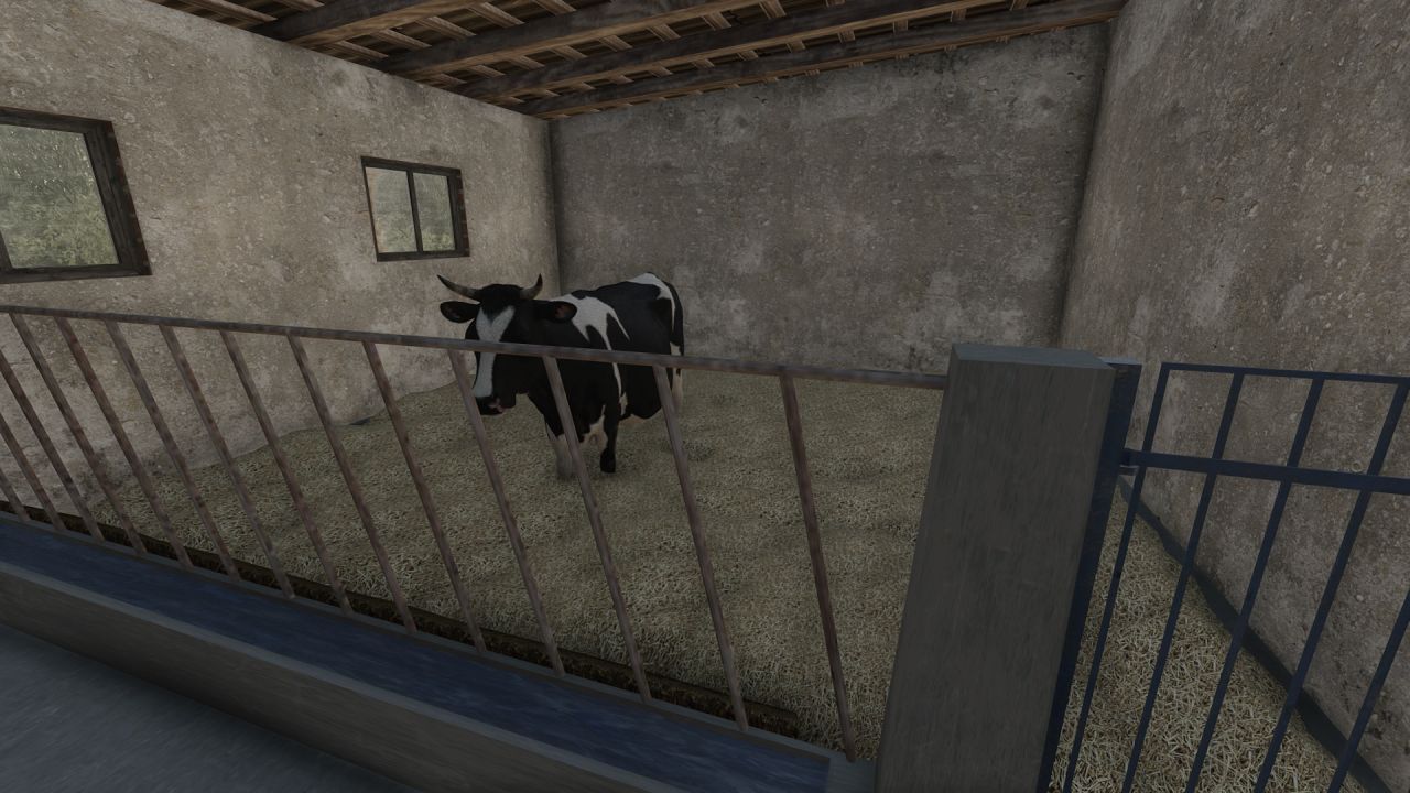 Granero polaco con vacas y garaje.