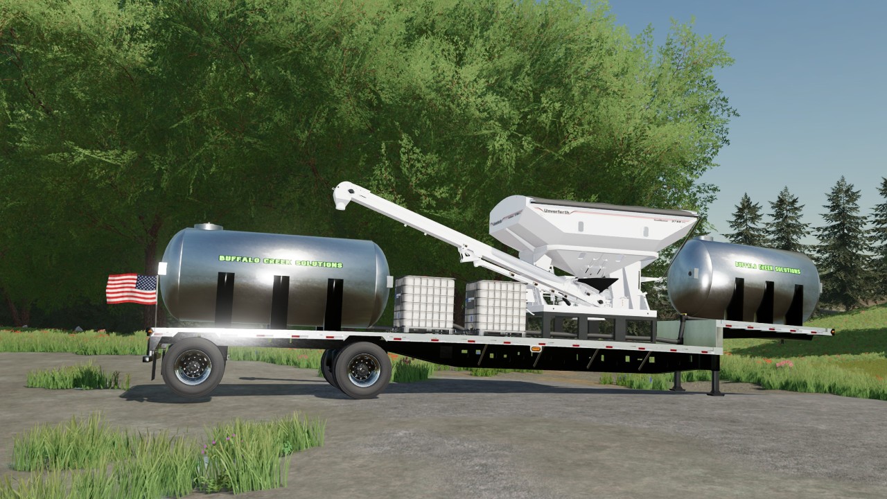 Seed and fertilizer trailer