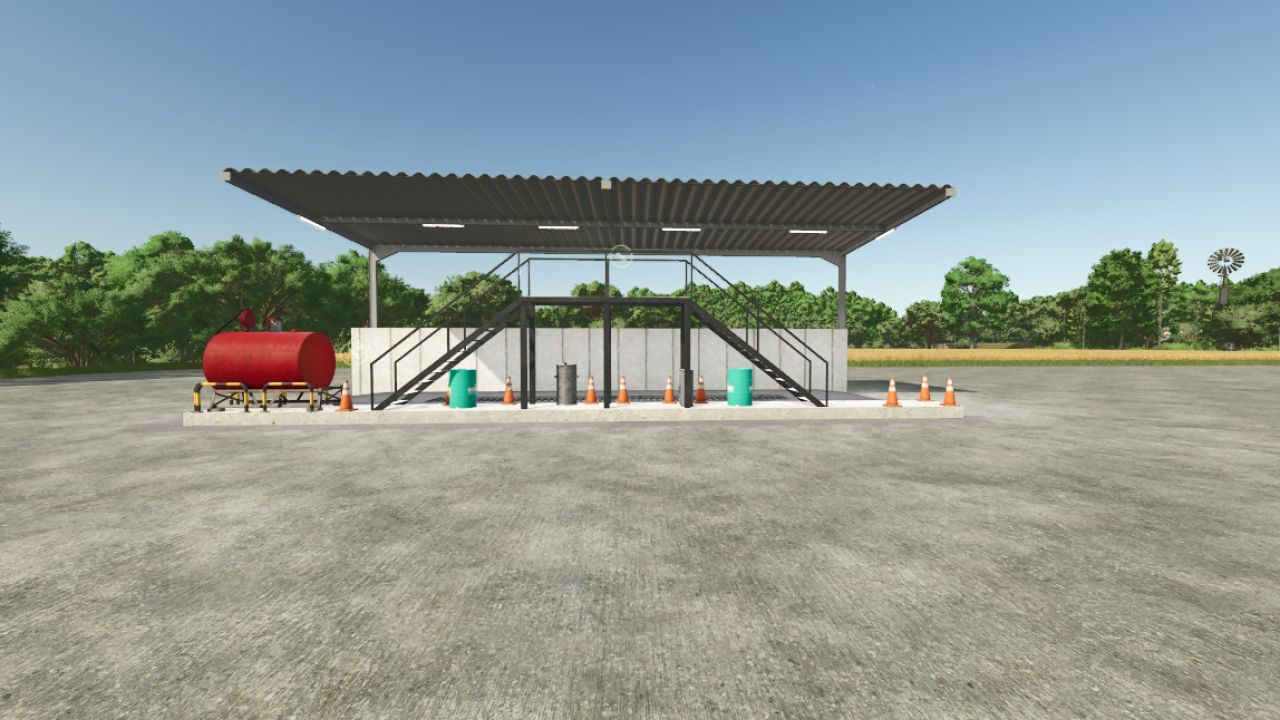 Área de lavar e oficina com um posto de gasolina
