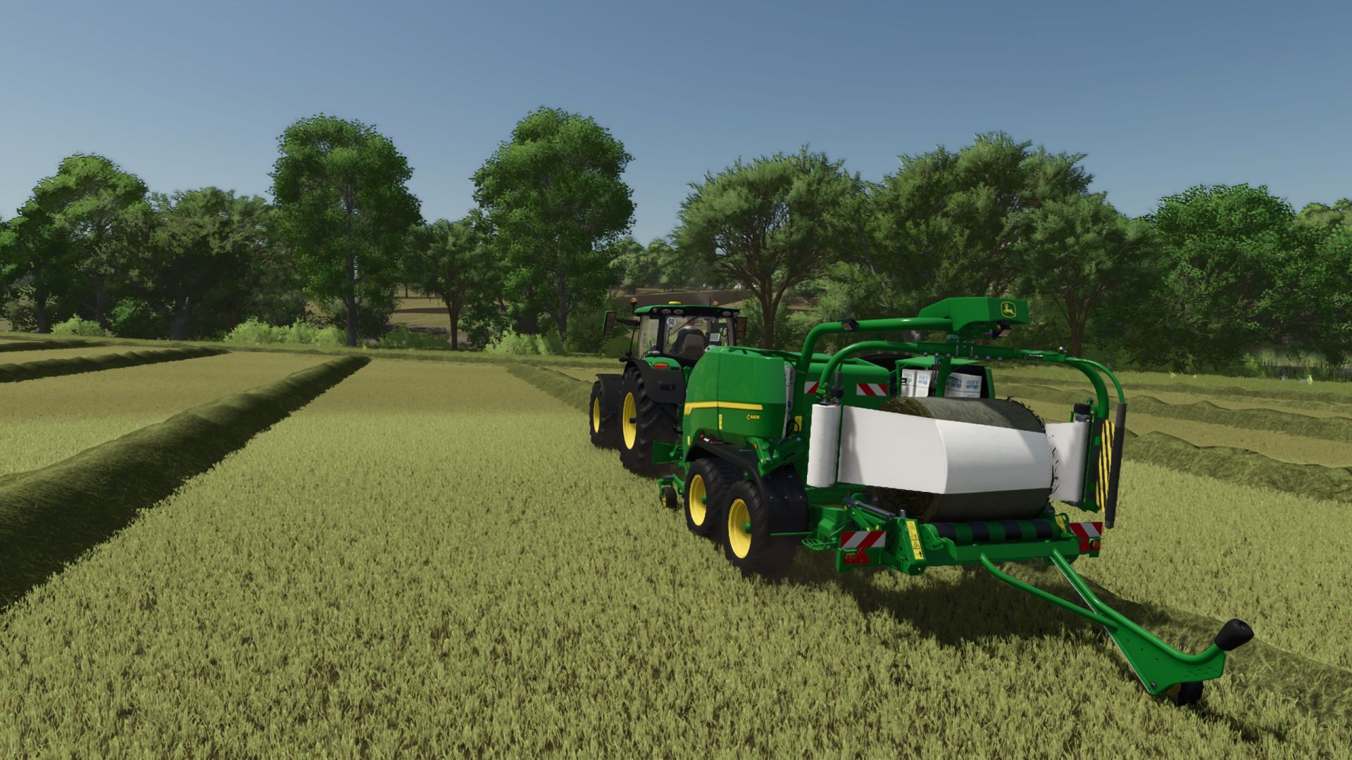 John Deere C441R (camera di precompressione e agente per insilato)