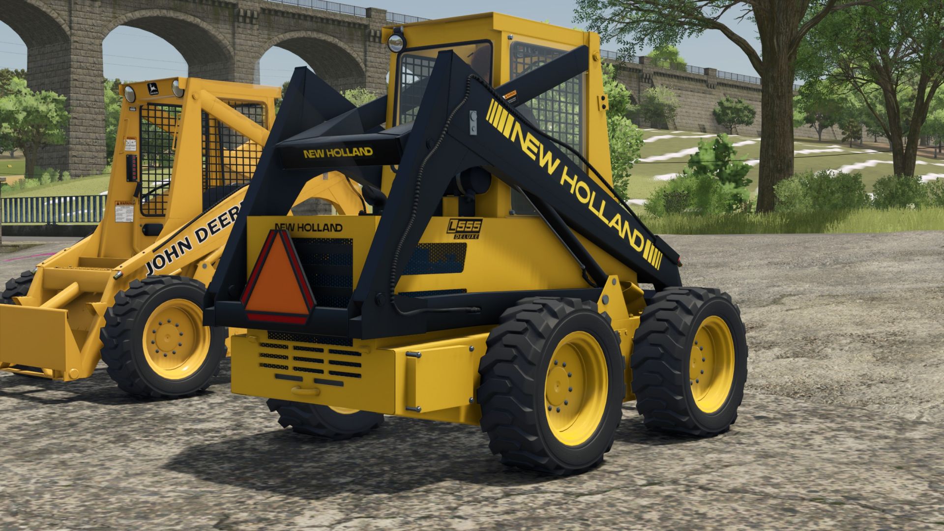 New Holland L555/John Deere 675/B