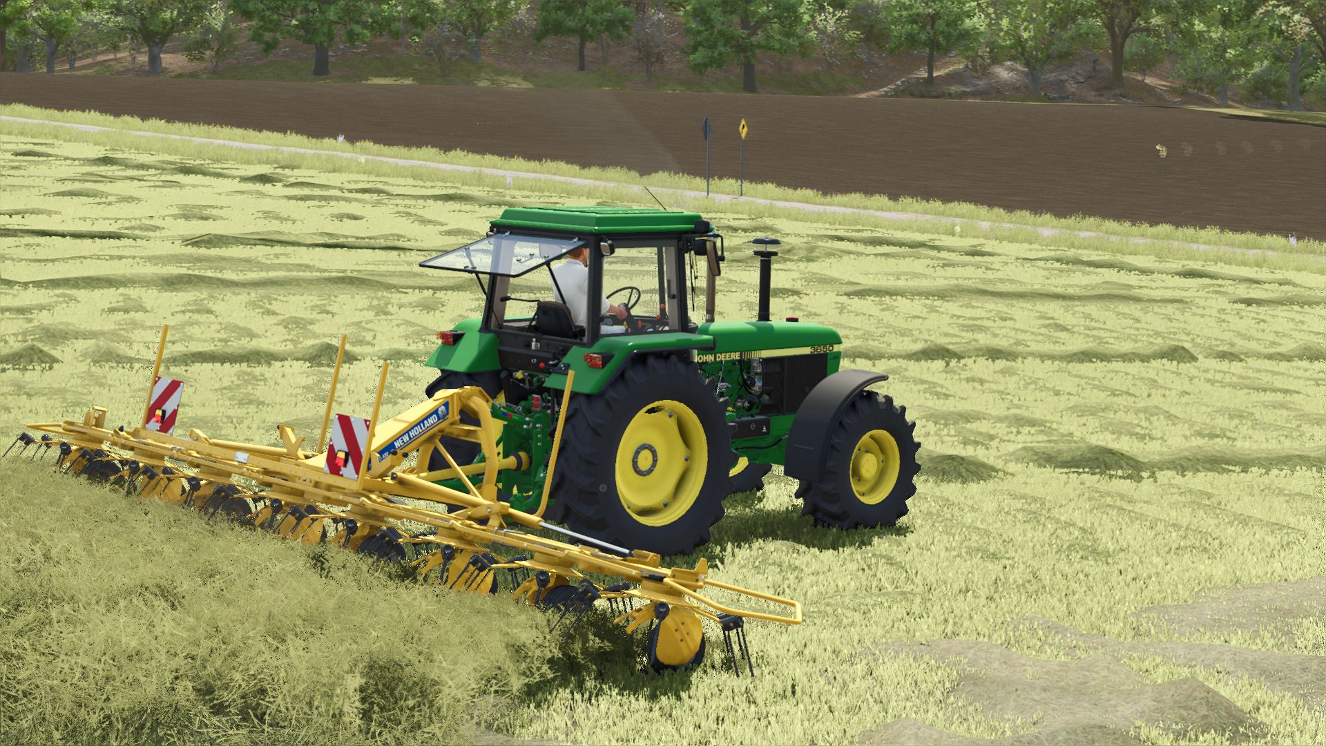 New Holland tedders and windrowers